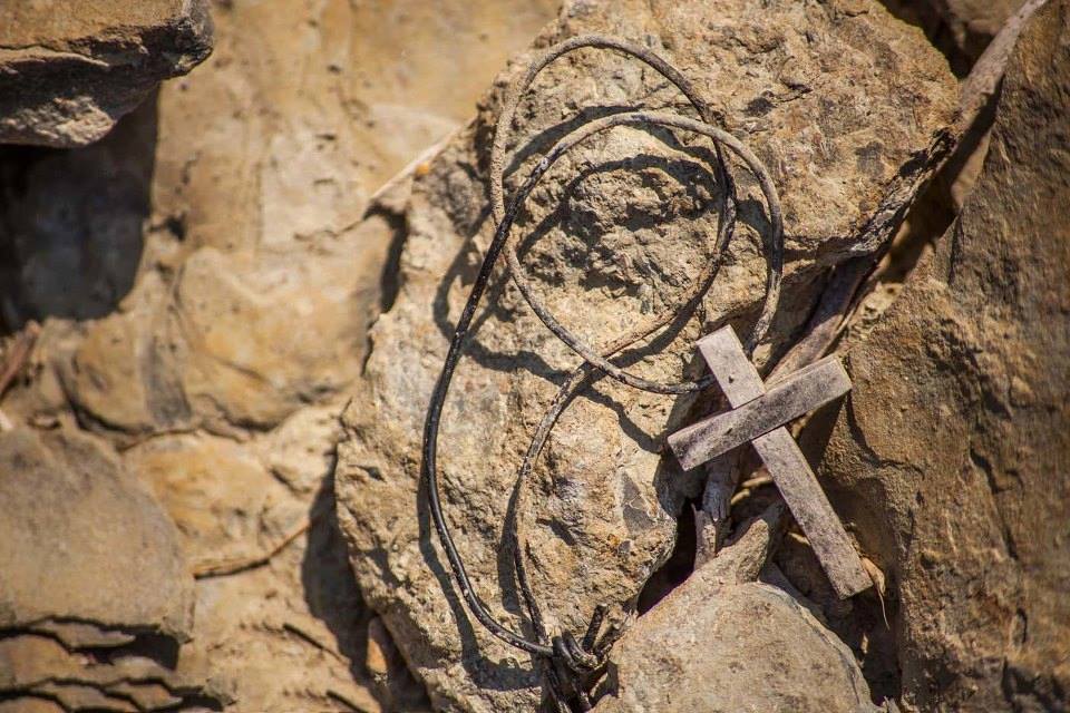 Photgraph of a cross on rocks